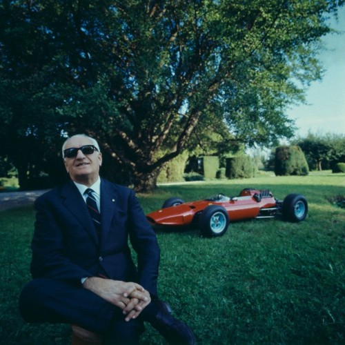 Enzo sitting in park F1 car.jpg